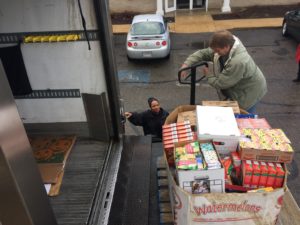 Millennium Employees Donate 1,943 Items to Foodbank This Christmas